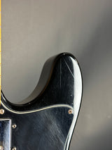 Close-up of a guitar pickup on a gray background