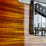 Wear on body of Used 1995 Fender Foto Flame Telecaster MIJ Autumn Burst.