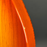 Ding on back edge of Used 1995 Fender Foto Flame Telecaster MIJ Autumn Burst.