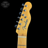 Fender guitar headstock on a black background with 'Tone Shop' logo.