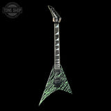 Green and black electric guitar with a unique design on a black background, featuring the Tone Shop logo.