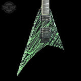 Green and black guitar with a unique pattern on a black background, featuring the Tone Shop logo.