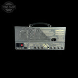 The rear view of a vintage Victory VX1000 tube amplifier head, featuring gold text and labels on a dark gray metal chassis with a black carrying handle, set against a solid black background.