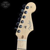 Fender guitar headstock on a black background with 'Tone Shop' logo.