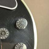 Scratches on body of Used Epiphone Inspired by Gibson Les Paul Custom Ebony.
