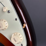 Wear on body of Used 2014 Fender American Deluxe Stratocaster Plus Sunburst.