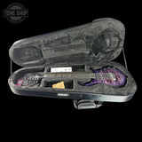 Guitar case with a guitar inside on a black background, featuring the Tone Shop logo.