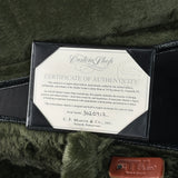 Certificate of authenticity on a guitar with visible branding