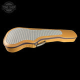 Guitar case with checkered interior on a black background, featuring 'Tone Shop' logo.