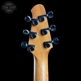 Guitar headstock with tuning pegs on a black background, featuring 'Tone Shop' logo.