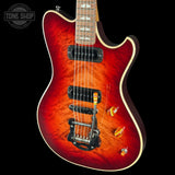 Electric guitar with a red flame finish on a black background, featuring the Tone Shop logo.