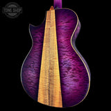Purple and gold acoustic guitar on a black background with 'Tone Shop' logo.