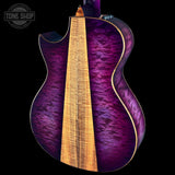 Glossy purple electric guitar with a visible brand logo in the corner.