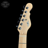 Guitar headstock with brand logo on a black background