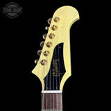 Gibson guitar headstock with brand logo on a black background