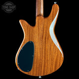 Wooden electric guitar body with a black pickguard on a black background, featuring 'Tone Shop' logo.