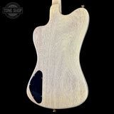 Back view of a guitar body with a visible brand logo in the corner.