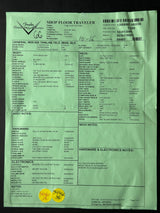 Green paper with printed text and a yellow label on a black background