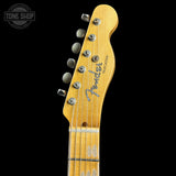Fender Telecaster guitar headstock on a black background