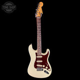 Electric guitar with a cream finish and brown pickguard on a black background, featuring 'Tone Shop' branding.