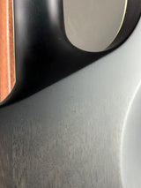 Close-up of a car's dashboard with a focus on texture and color contrast.