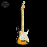 Electric guitar with a sunburst finish on a black background, featuring the Tone Shop logo.