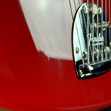 Ding on body of Used 2022 Fender American Vintage II 66 Jazzmaster Dakota Red.