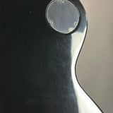 Wear on back of Used 2026 Gibson Les Paul Studio Dark.