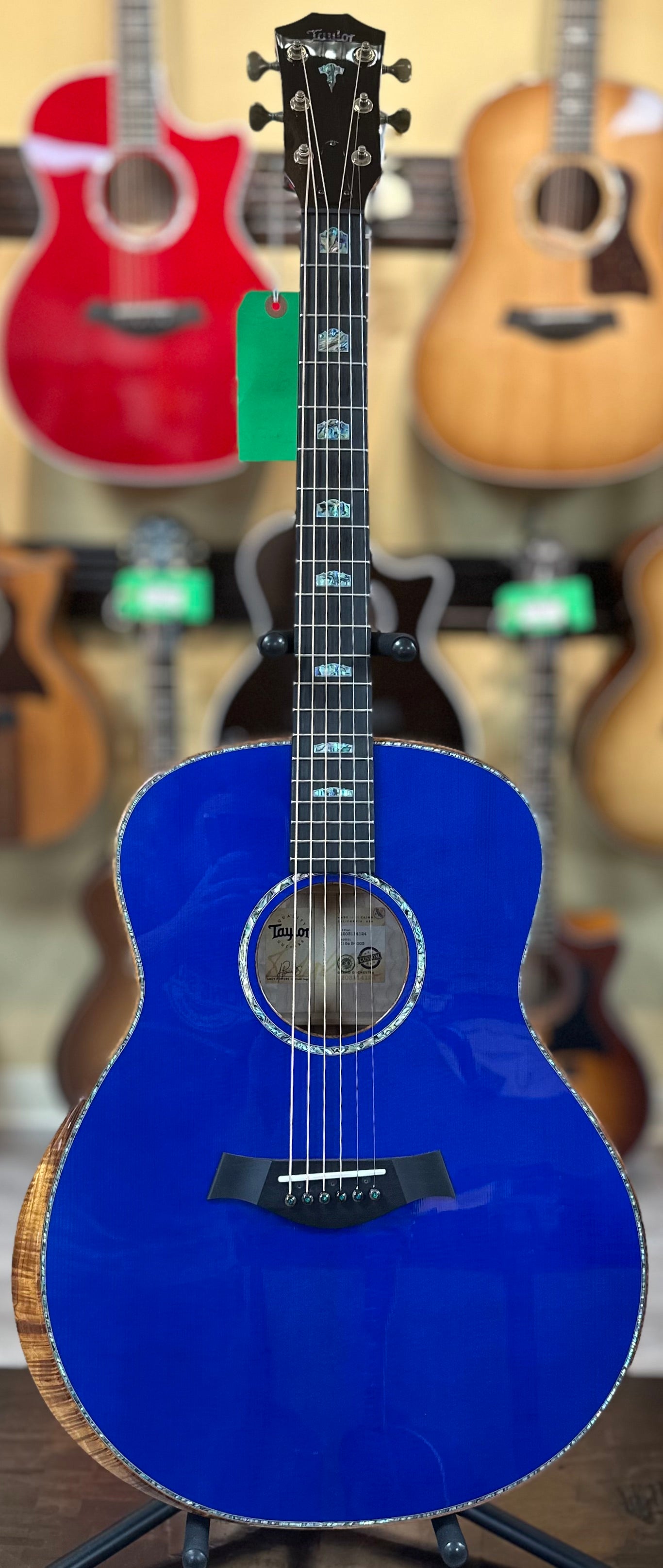 Full front of Taylor Custom #3: C18e Grand Orchestra Lutz Spruce/Quilted Maple Royal Blue w/case