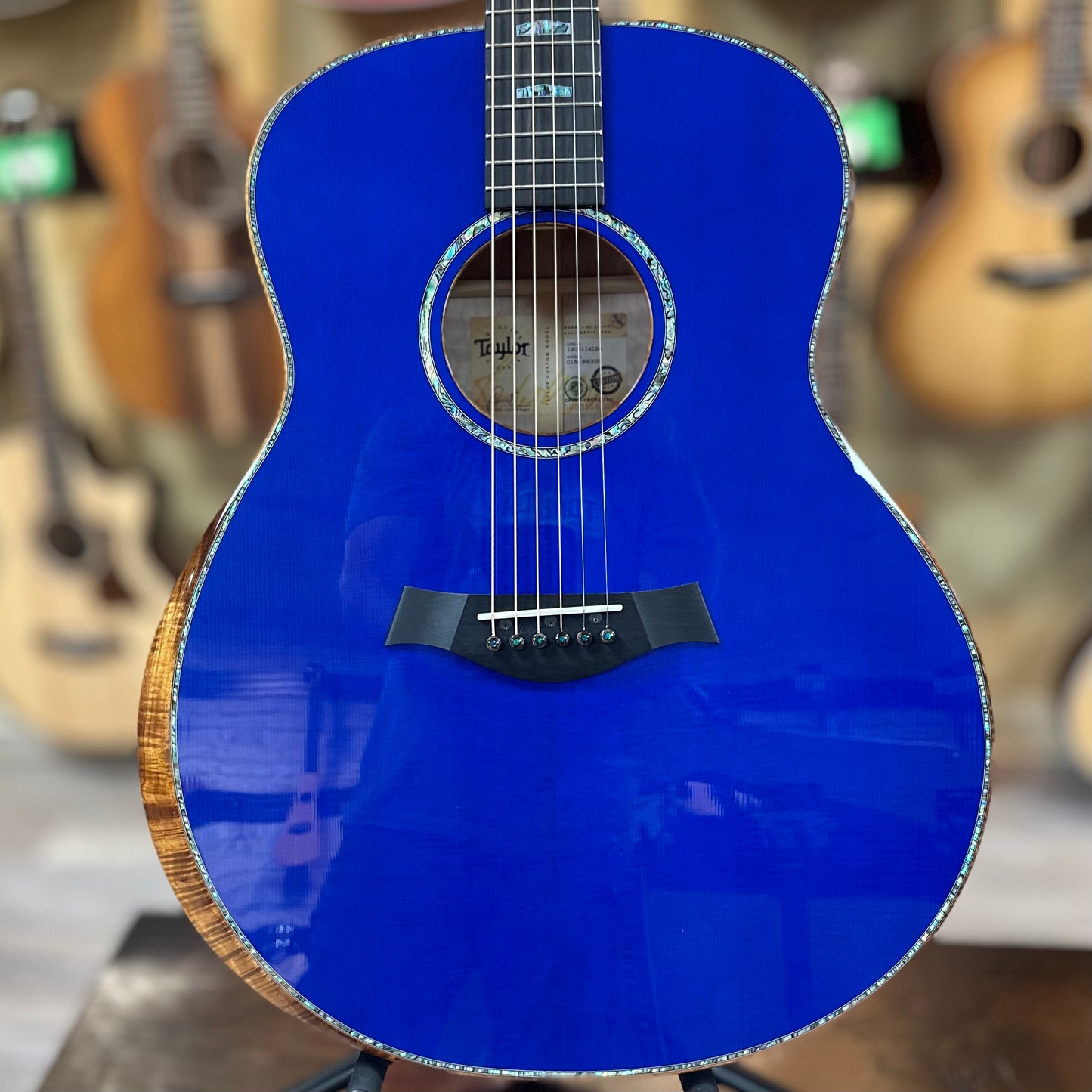 Front of Taylor Custom #3: C18e Grand Orchestra Lutz Spruce/Quilted Maple Royal Blue w/case