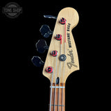 Fender Mustang Bass headstock with brand logo on a black background