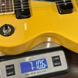 Used Epiphone Les Paul Special TV Yellow on scale displaying weight.