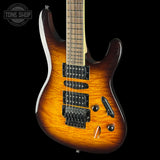Electric guitar with a sunburst finish on a black background, featuring the Tone Shop logo.