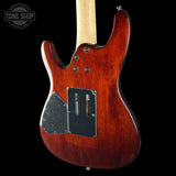 Electric guitar with a sunburst finish on a black background, featuring the Tone Shop logo.