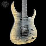 Electric guitar with a wood finish on a black background, featuring the Tone Shop logo.