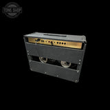 Guitar amplifier with visible brand logo on a black background