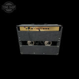Guitar amplifier with 'Tone Shop' logo in the corner