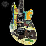 Colorful electric guitar with abstract design on a black background, featuring the Tone Shop logo.