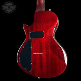 Red electric guitar on a black background with 'Tone Shop' logo.