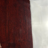 Scratches on back of Used Taylor 410E LTD Baritone Sunburst.