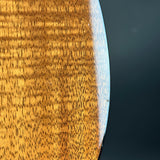 Close-up of a wooden surface with a dark background