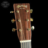 Guitar headstock with 'Martin & Co' branding on a black background