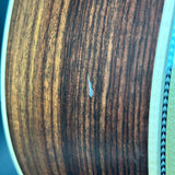 Close-up of a wooden surface with a blue background