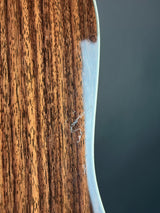 Close-up of a wooden surface with a dark gray background
