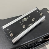 Footswitch control panel on a guitar amplifier with 'Express' branding.