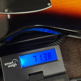 Used 2024 Fender Player II HH Telecaster Sunburst on scale displaying weight.