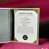 Gibson Custom Certificate of Authenticity on a red background