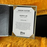 Gibson Custom Certificate of Authenticity on a textured surface