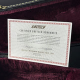 Gretsch Certified Guarantee certificate inside a guitar case