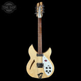 Electric guitar with a black and white logo on a black background
